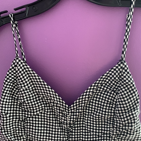 We have a very pretty and comfortable checkered Dress. White and Black design. - Picture 2 of 4